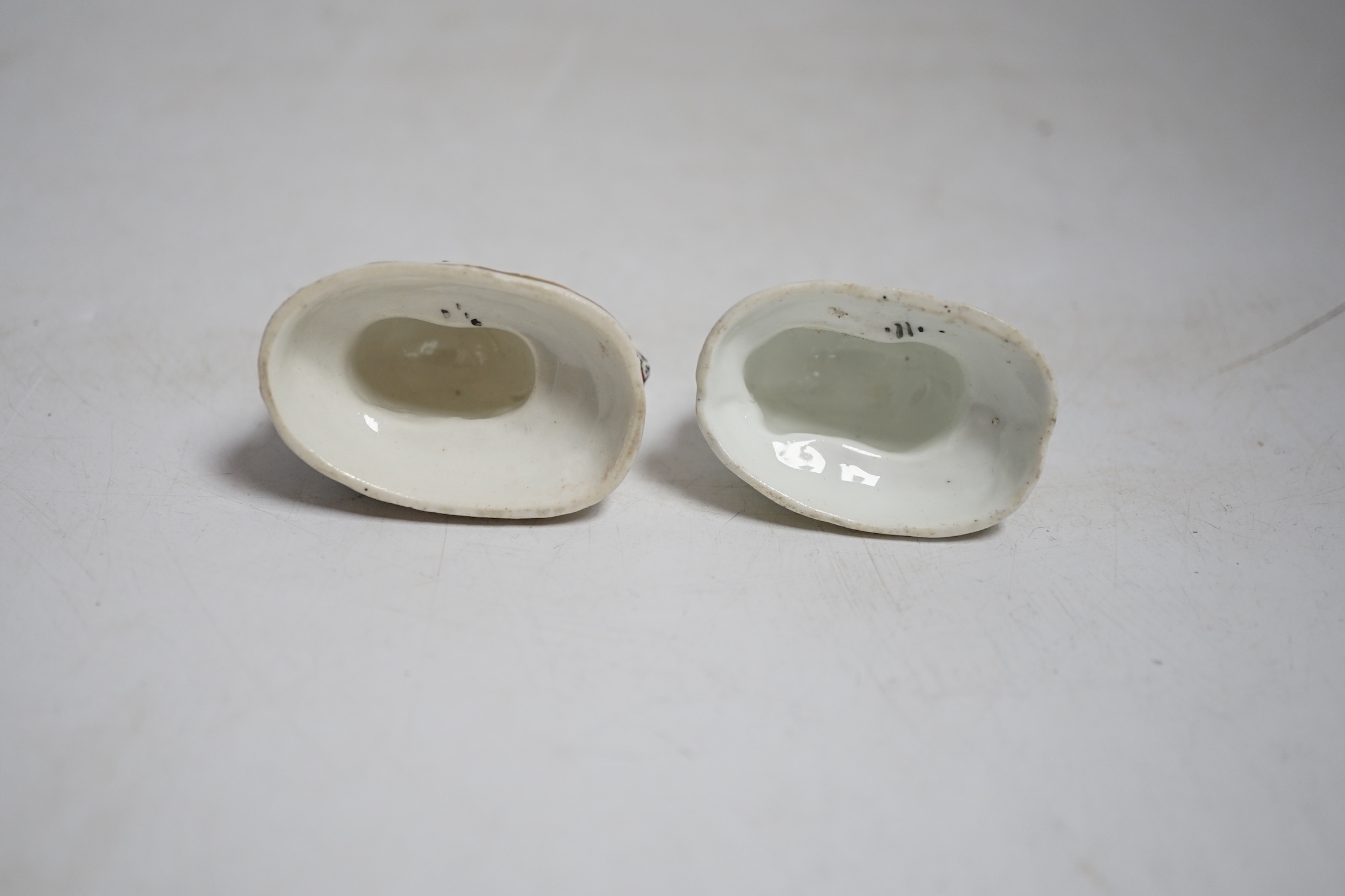 Two Staffordshire porcelain toy models of rabbits, c.1830–50, Provenance: Dennis G. Rice collection, 5 cms wide.